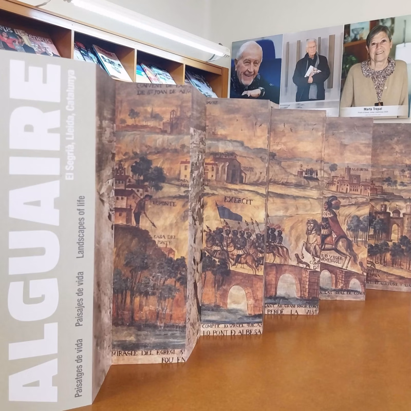 Recogida del desplegable 'Alguaire, Paisatges de vida' por Sant Jordi en Alguaire